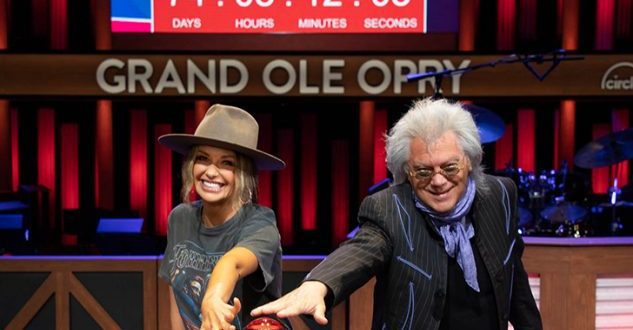 Opry members Carly Pearce and Marty Stuart start the official countdown clock to the Opry's 5,000th Saturday night broadcast. Photo by Chris Hollo